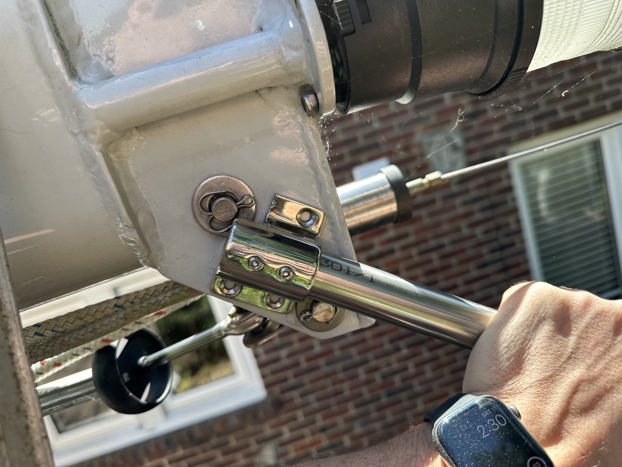 316 stainless 1-inch pole mount bracket being attached to the masthead fitting