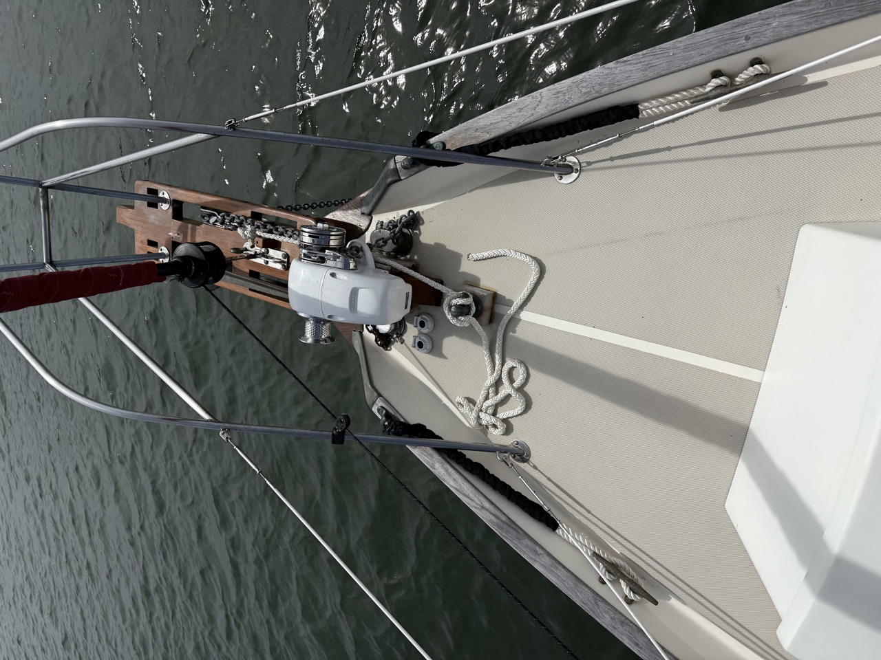 Lewmar H2 windlass on teak platform with cleats port and starboard