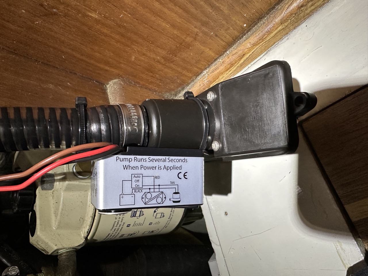 Water Witch solid-state bilge sensor mounted at the low point of the bilge alongside the Jabsco convenience pump