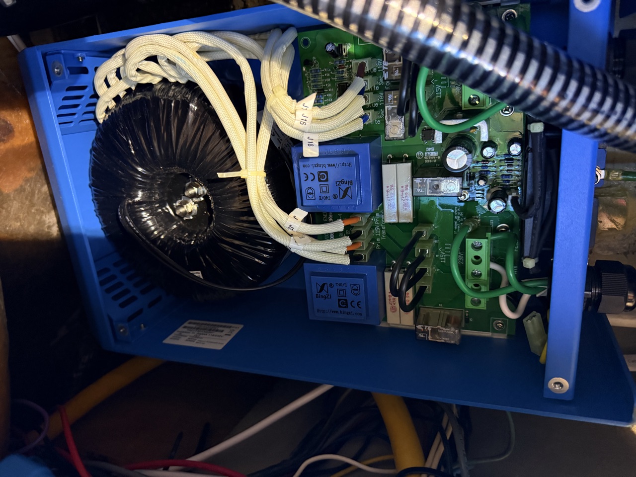 Inside the Victron 2000W Isolation Transformer after the 8-cable swap, now configured in buck mode to reduce incoming voltage rather than boost it