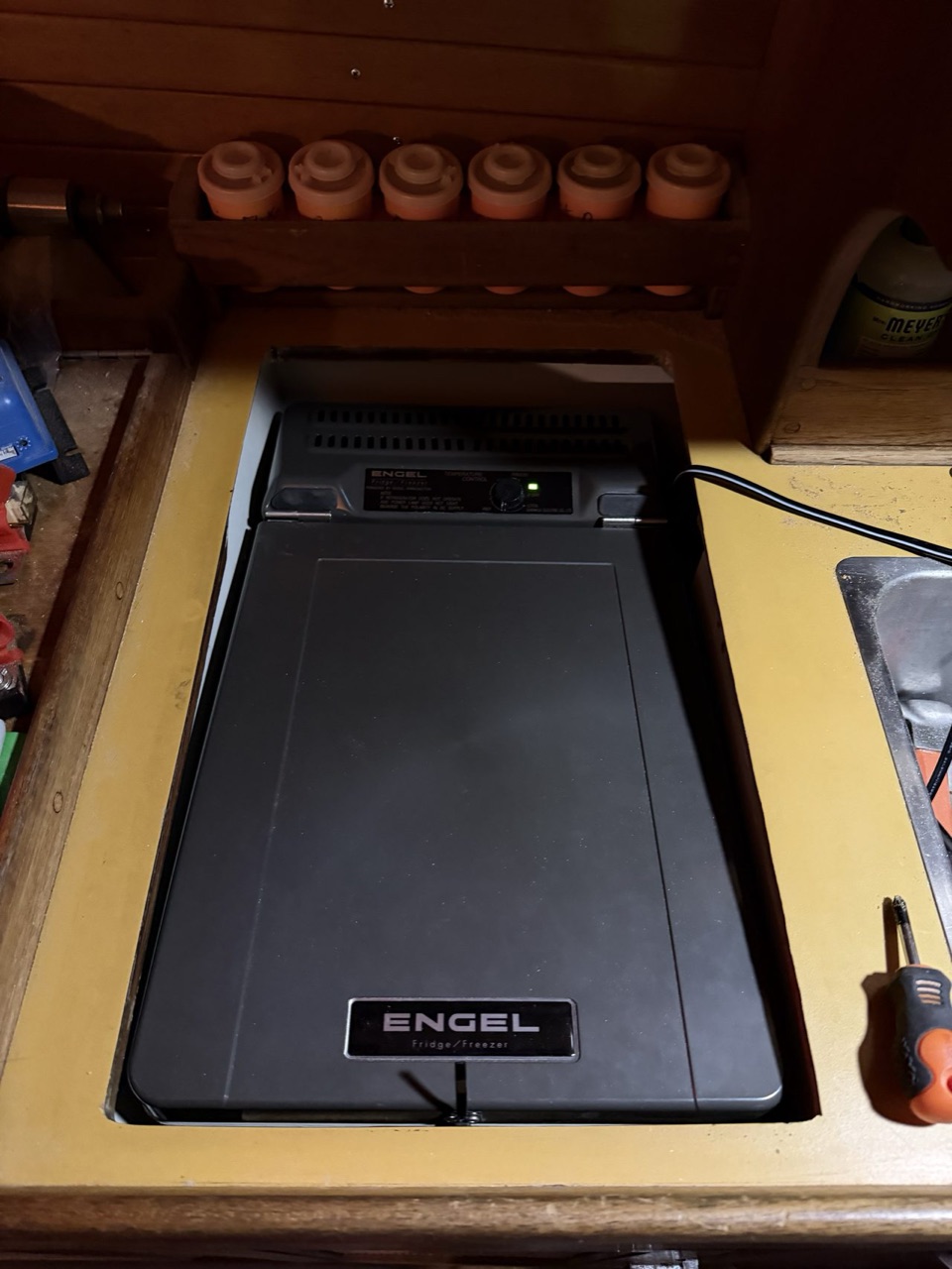 Engel MT27 sitting in the icebox opening from above, showing the near-flush fit