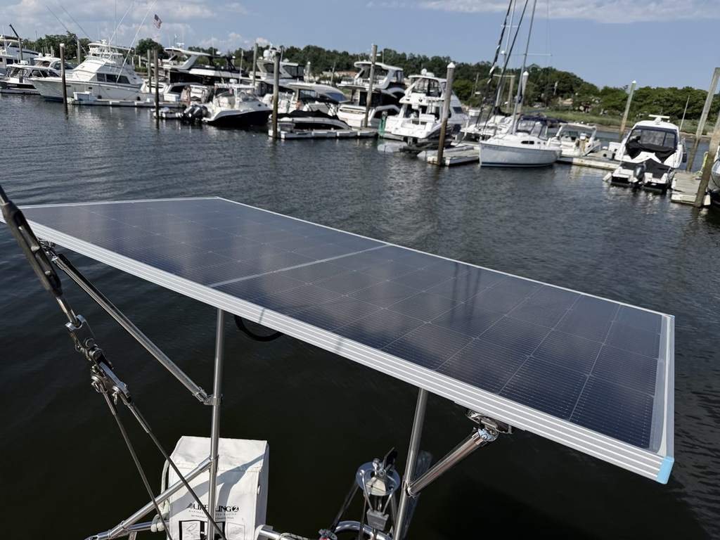 Close view of the Renogy solar panel mounted on the stern arch